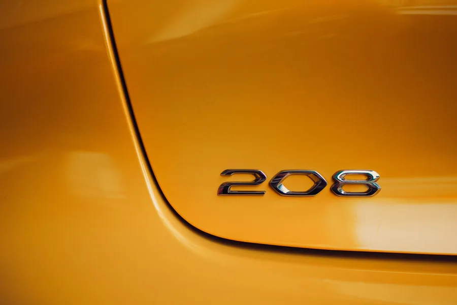 The rear of a Peugeot 208, the cheapest diesel car in the Dutch ranking, showing the 208 badge