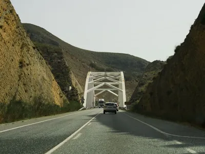 A car driving on a road towards Cordoba in southern Spain