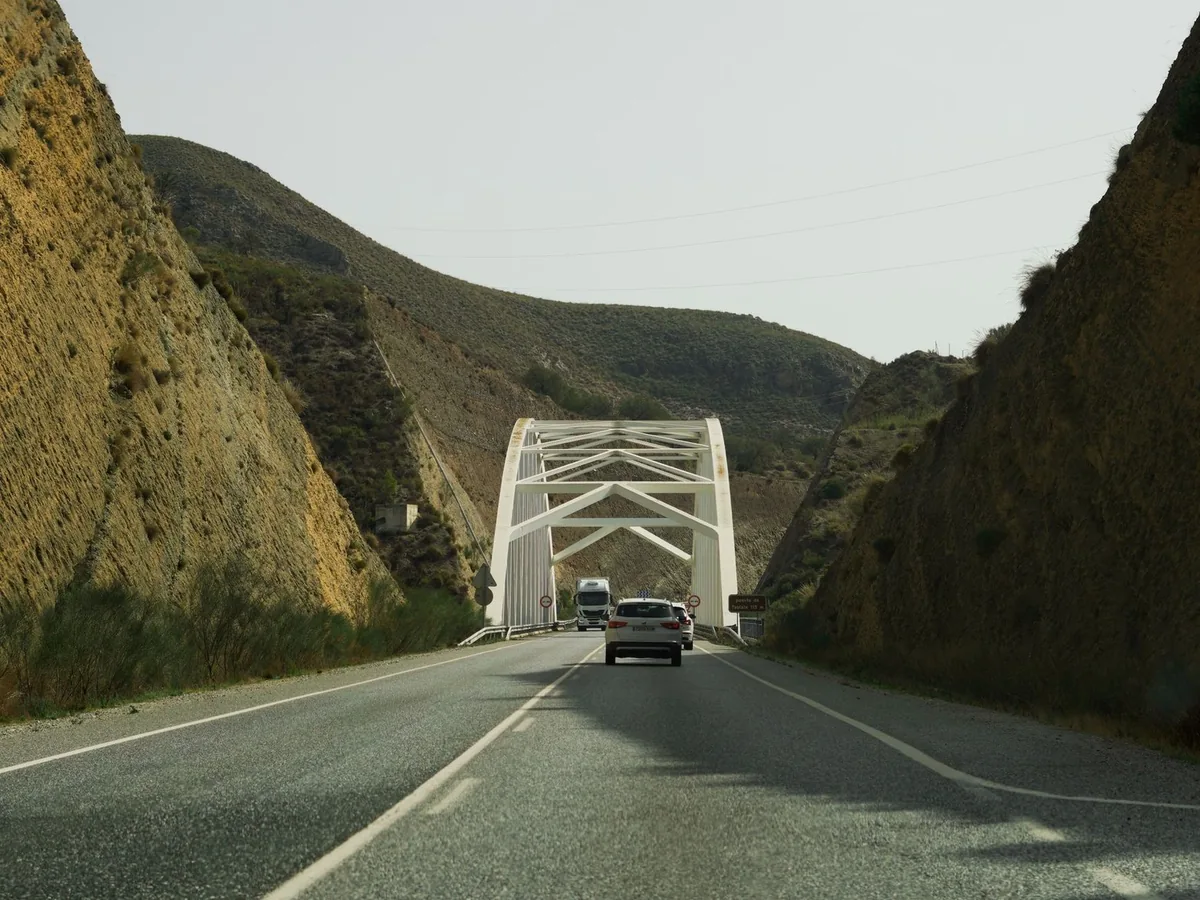 A car driving on a road towards Cordoba in southern Spain